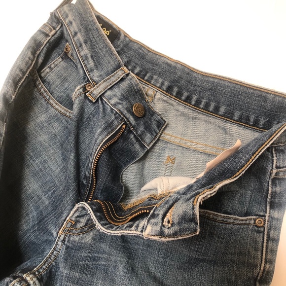 Vintage Lee Distressed straight leg denim.